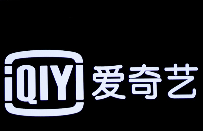 iQiyi Inc., logo is displayed on screen during company's IPO at Nasdaq Market Site in New York