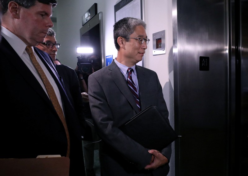 Former associate deputy U.S. attorney general Bruce Ohr enters an elevator after testifying behind closed doors on Capitol Hill in Washington