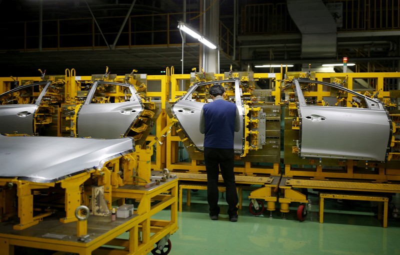 FILE PHOTO: A worker works at a plant of Hyundai Motor in Asan