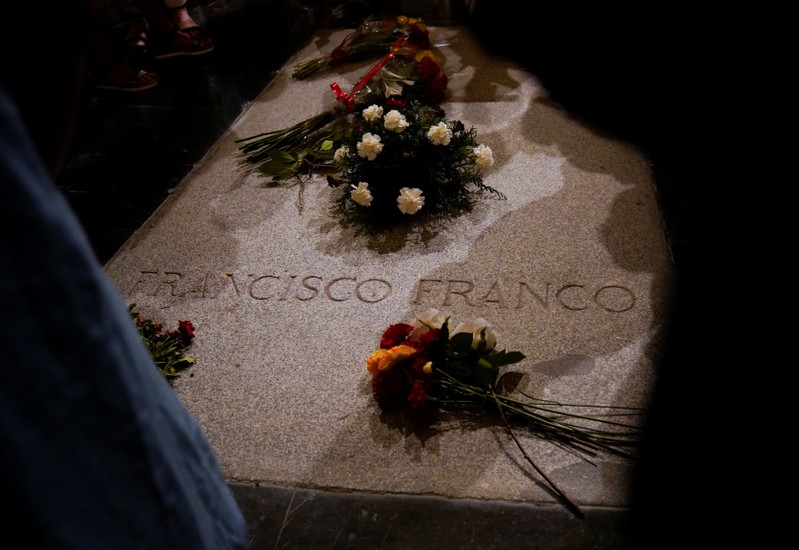 Flowers lie on the tomb of Spanish dictator Francisco Franco at El Valle de los Caidos in San Lorenzo de El Escorial, outside Madrid