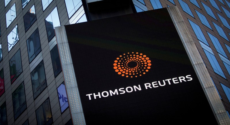 FILE PHOTO: The Thomson Reuters logo is seen on the company building in Times Square, New York