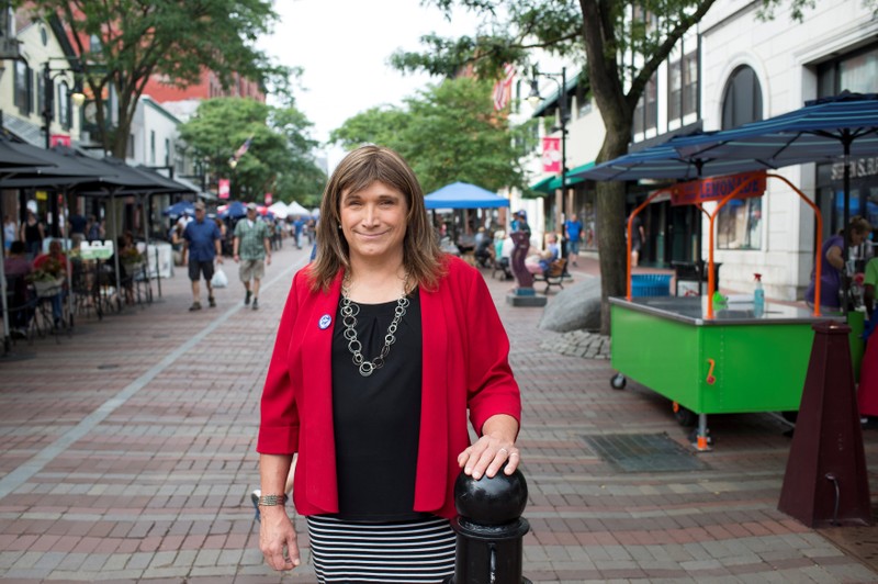 Vermont Democratic Party gubernatorial primary candidate Christine Hallquist, a transgender woman, poses as she campaigns on Church Street in Burlington, Vermont