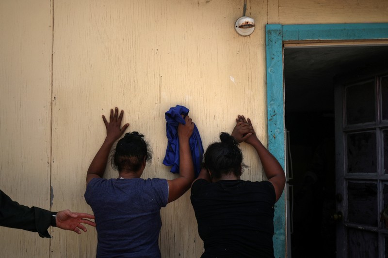 Women from Dominican Republic are apprehended by border patrol for illegally crossing into the U.S. border from Mexico in Los Ebanos, Texas