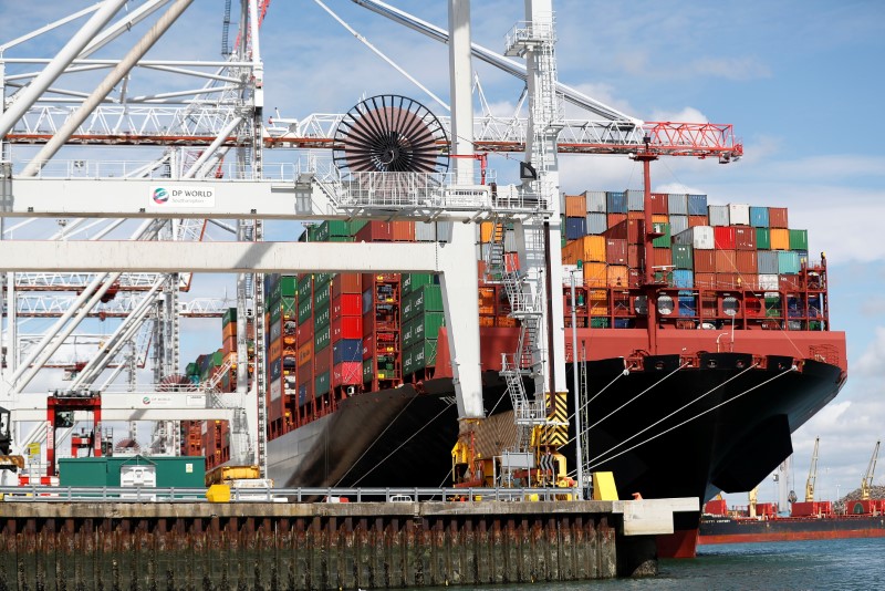 FILE PHOTO: Shipping containers are stacked on a cargo ship in the dock at the ABP port in Southampton