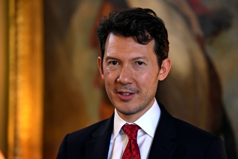 FILE PHOTO: Smith poses for a picture during a reception at the 2016 International Air Transport Association Annual General Meeting and World Air Transport Summit in Dublin