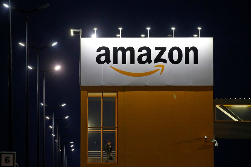 FILE PHOTO: Amazon logo is seen at the company logistics center in Lauwin-Planque