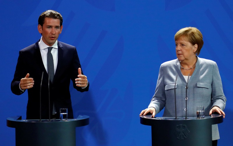 German Chancellor Angela Merkel and Austrian Chancellor Sebastian Kurz give a statment to the media in the chancellery in Berlin