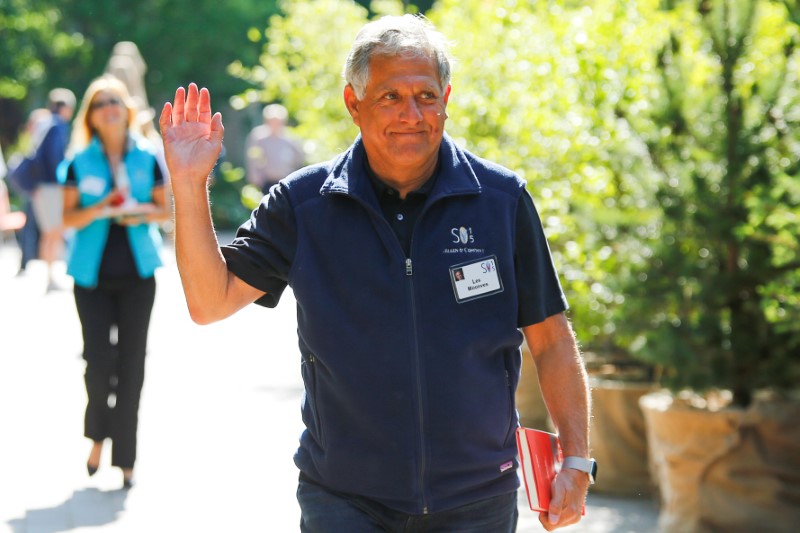 FILE PHOTO: CEO of CBS Corp, Moonves waves on the first day of the annual Allen and Co. media conference in Sun Valley