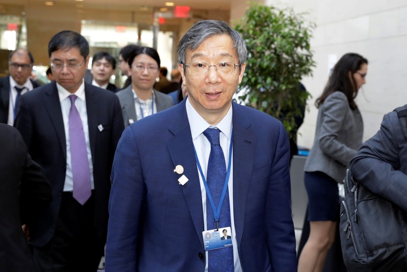 FILE PHOTO: China's Central Bank Governor Yi Gang arrives at IMFC plenary