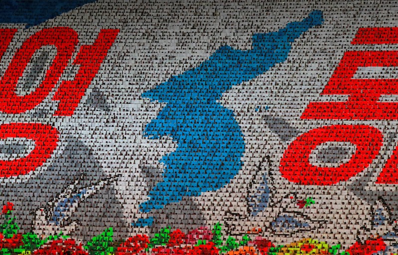 Participants form a map of Korean peninsula at Mass Games in May Day stadium marking the 70th anniversary of North Korea's foundation in Pyongyang