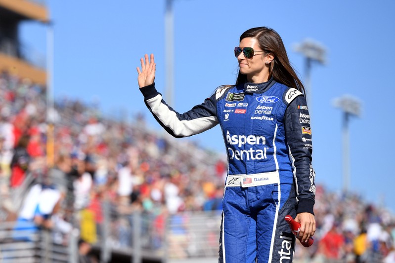 FILE PHOTO: NASCAR Cup Series driver Patrick waves before the Ford EcoBoost 400 in Homestead