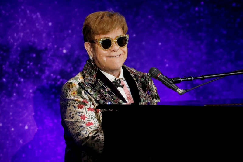 FILE PHOTO: Singer Elton John performs before announcing his final 