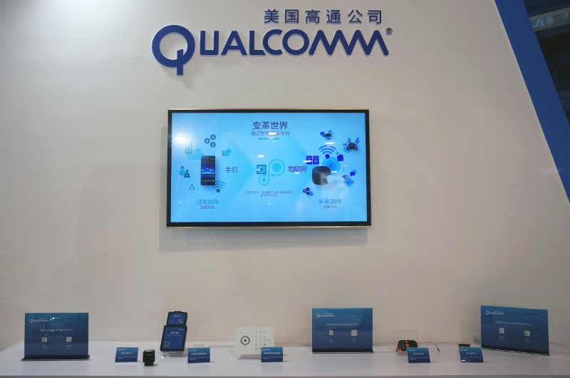 FILE PHOTO - Booth of U.S. chipmaker Qualcomm is pictured at an expo in Beijing
