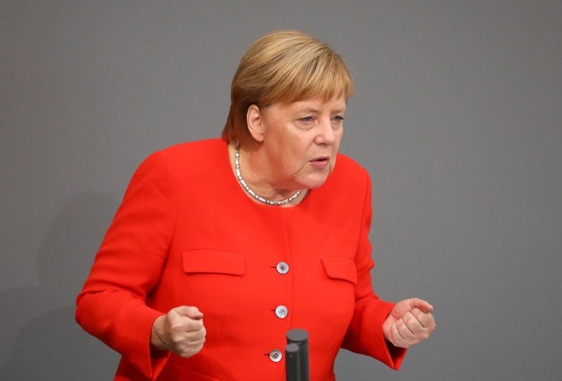 German Chancellor Angela Merkel speaks during a session at the lower house of parliament Bundestag in Berlin