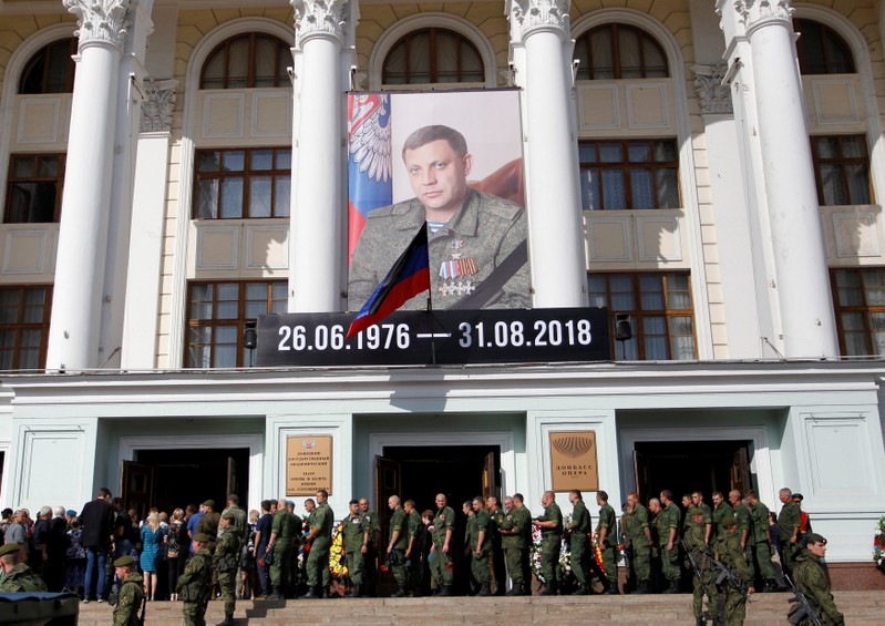 FILE PHOTO - People wait in line to pay their last respects to PM of the self-proclaimed Donetsk People's Republic Zakharchenko in Donetsk