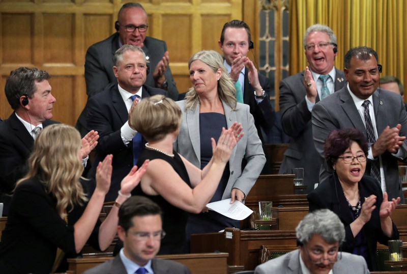 MP Alleslev receives a standing ovation in the House of Commons on Parliament Hill in Ottawa