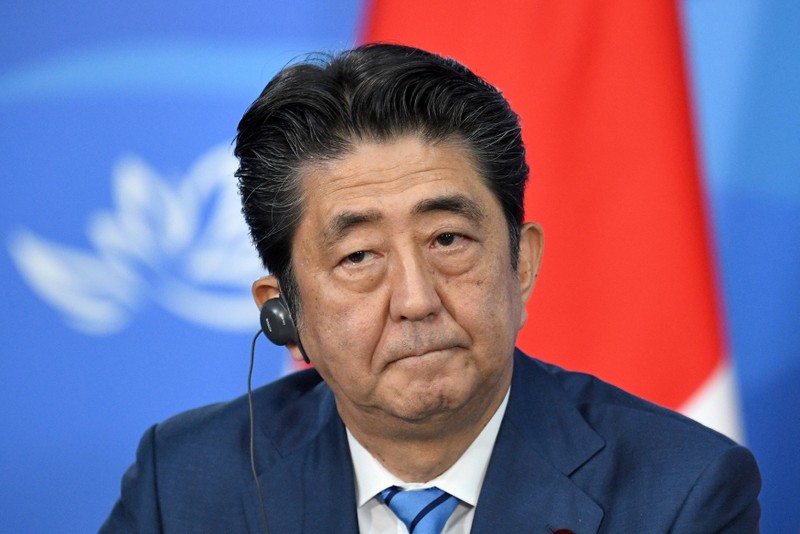 Japanese PM Abe attends a joint news conference with Russian President Putin following their meeting on the sidelines of the Eastern Economic Forum in Vladivostok