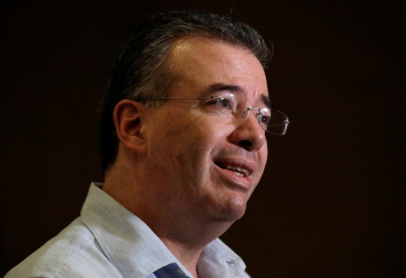 FILE PHOTO: Mexico's central Bank Governor Alejandro Diaz de Leon Carrillo speaks during an interview with Reuters on the sidelines of the Mexican Banking Association's annual convention in Acapulco
