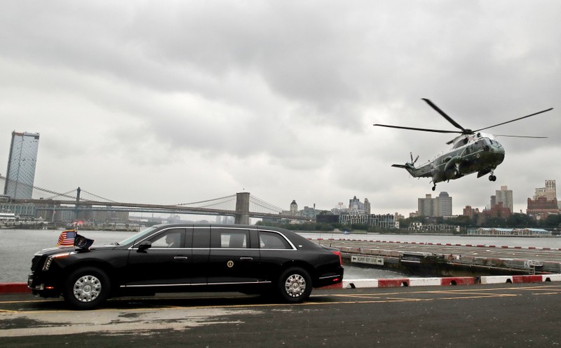 FILE PHOTO: Marine One carrying U.S. President Donald Trump lands behind his new Cadillac limousine in New York City
