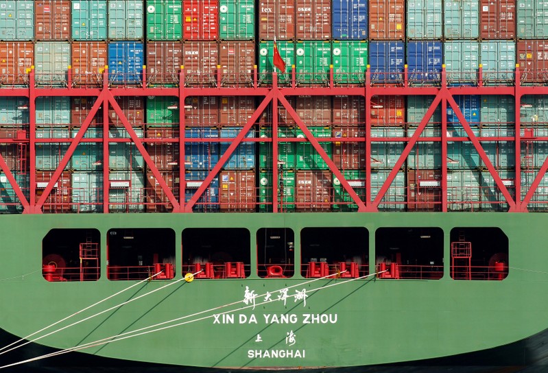 FILE PHOTO: China Shipping containers sit on a ship in the Port of Los Angeles after being imported to the U.S.