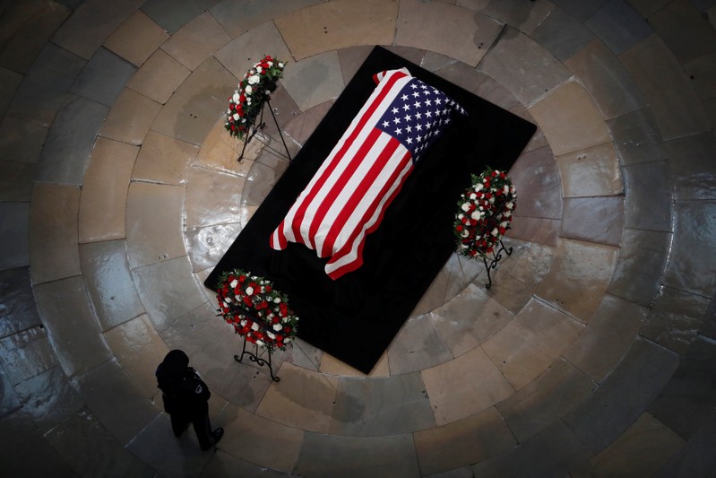 A casket with the body of late U.S. Senator McCain lies in state in the Rotunda at the U.S. Capitol in Washington