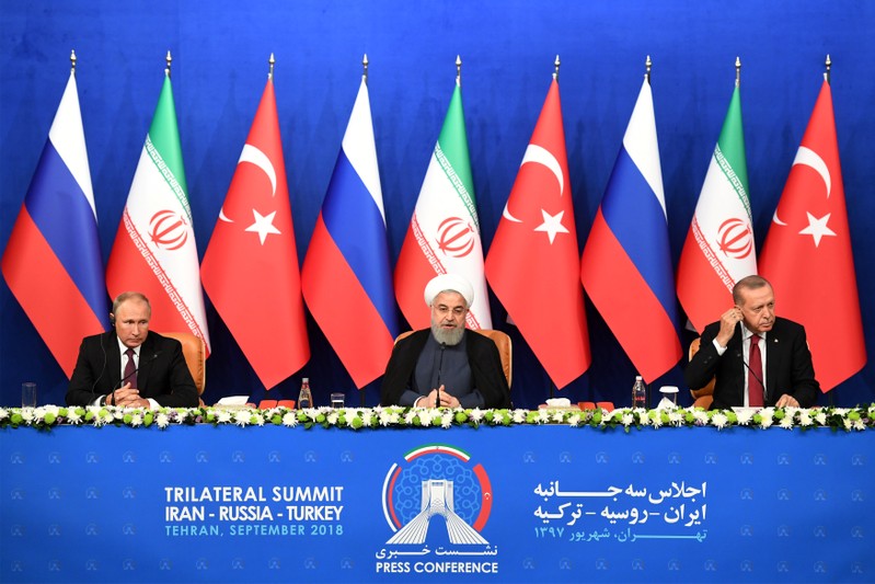 President Putin of Russia, Rouhani of Iran and Erdogan of Turkey attend a news conference following their meeting in Tehran