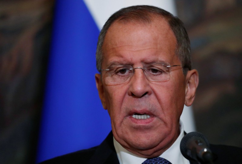 FILE PHOTO - Russian Foreign Minister Lavrov speaks during a joint news conference with Syrian Foreign Minister al-Moualem following their talks in Moscow