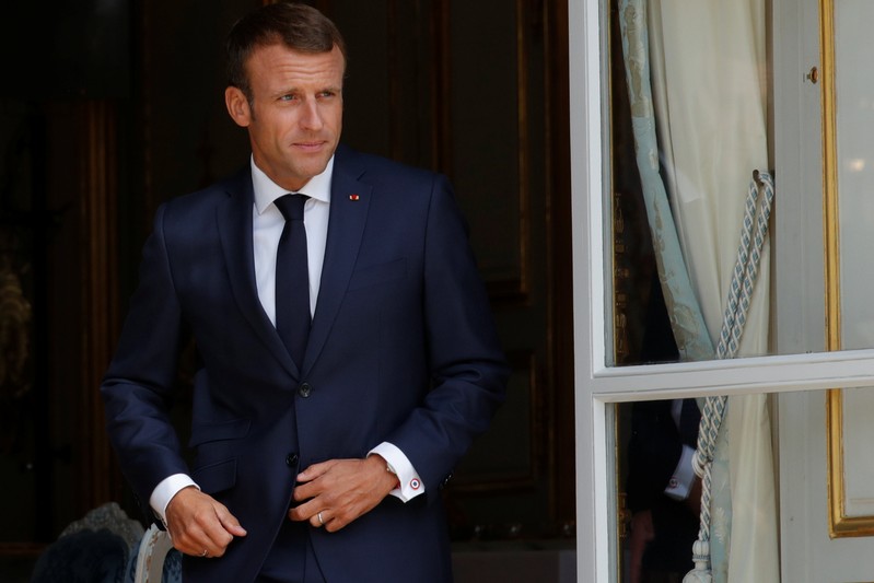 FILE PHOTO - French President Emmanuel Macron waits for the arrival of Armenian Prime Minister Nikol Pashinyan at the Elysee Palace in Paris