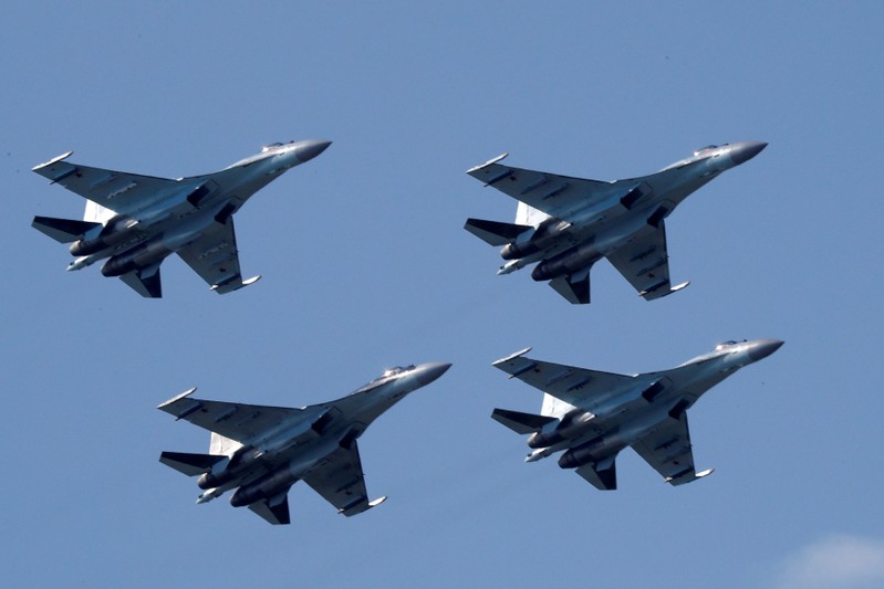 FILE PHOTO: Sukhoi Su-35 multi-role fighters of the Sokoly Rossii aerobatic team fly in formation during a demonstration flight at the MAKS 2017 air show in Zhukovsky