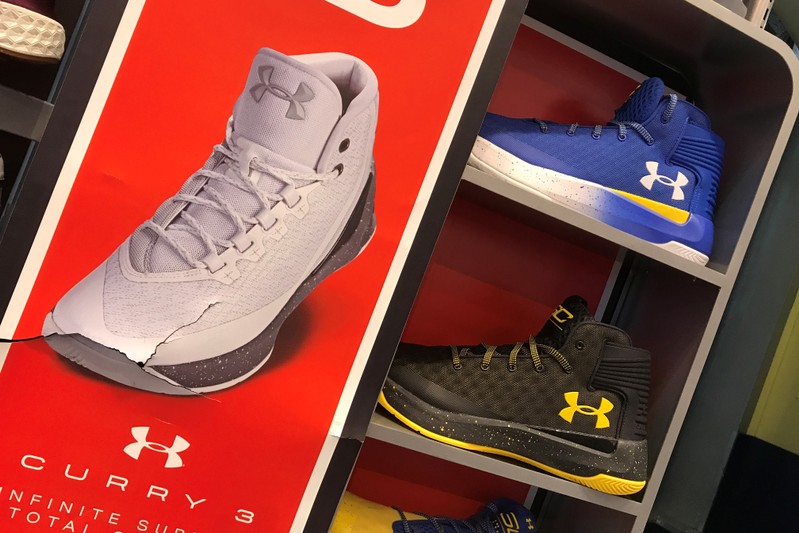 FILE PHOTO - A display for Under Armour merchandise is seen inside an athletic store in New York
