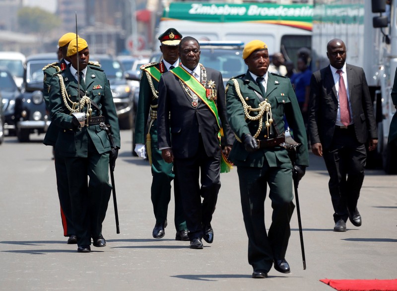 Zimbabwe's President Emmerson Mnangagwa arrives for the opening of Parliament in Harare