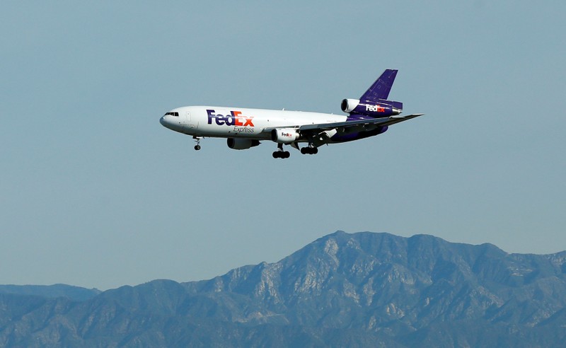 FILE PHOTO: A FedEx Express airplane is pictured during its approach to Los Angeles International Airport, in Los Angeles