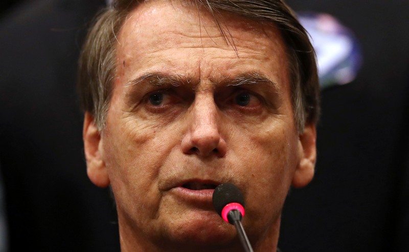 FILE PHOTO: Presidential candidate Jair Bolsonaro attends a news conference in Rio de Janeiro