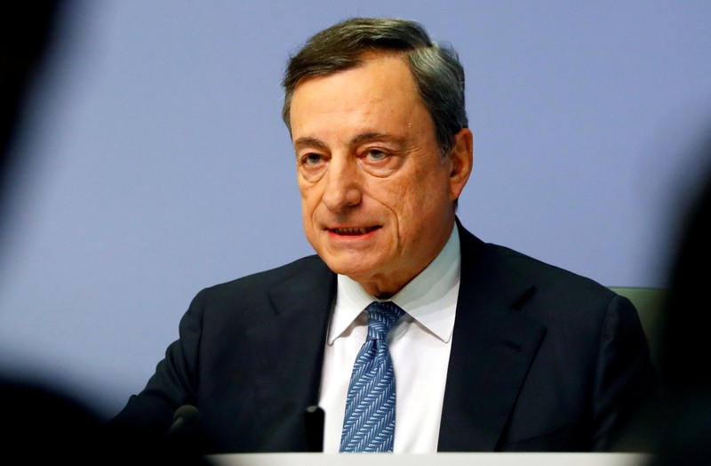 FILE PHOTO - ECB President Draghi speaks during a news conference following the governing council's interest rate decision at ECB headquarters in Frankfurt