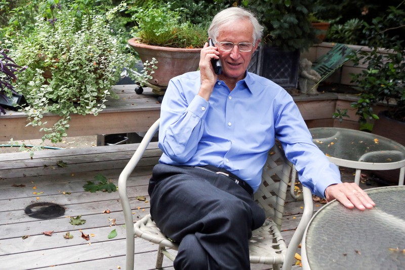 William D. Nordhaus speaks with his grandchildren on the phone at his home in New Haven