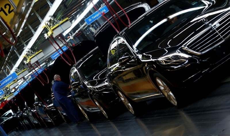 FILE PHOTO: Workers assemble Mercedes-Benz S-class models at their plant in Sindelfingen near Stuttgart