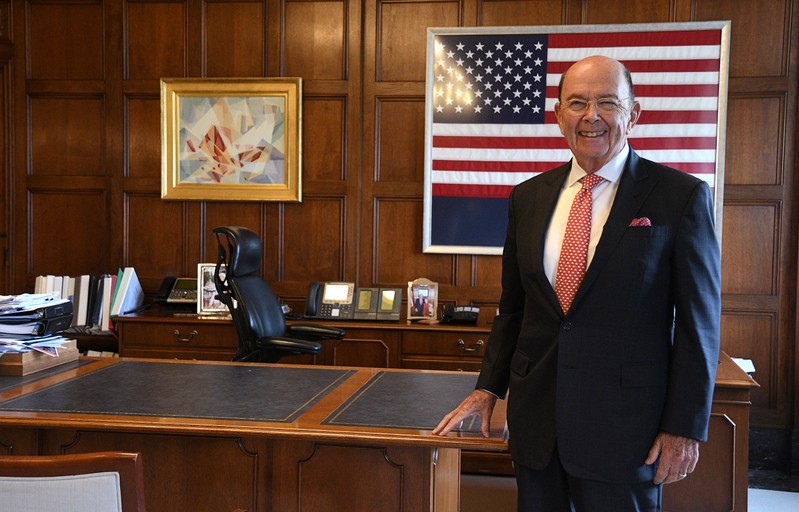U.S. Secretary of Commerce Ross poses in his office during Reuters interview at the U.S. Department of Commerce building in Washington