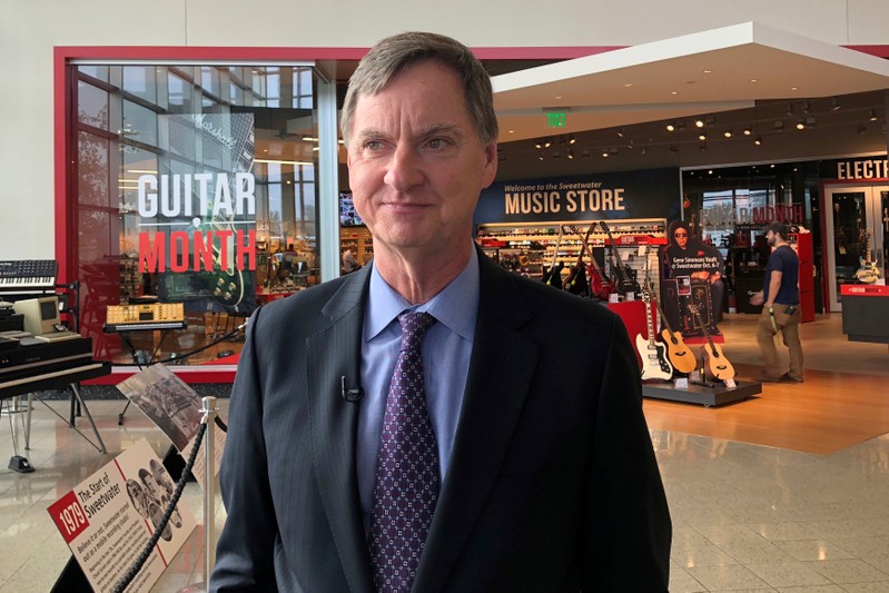 FILE PHOTO: Chicago Federal Reserve Bank President Evans visits the online music retailer Sweetwater in Fort Wayne