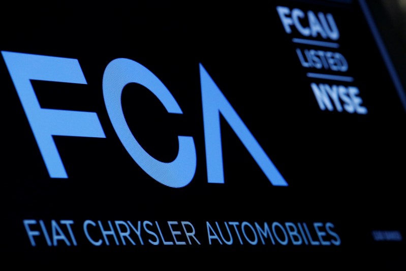A screen displays the ticker information for Fiat Chrysler Automobiles NV at the post where it's traded on the floorof the NYSE