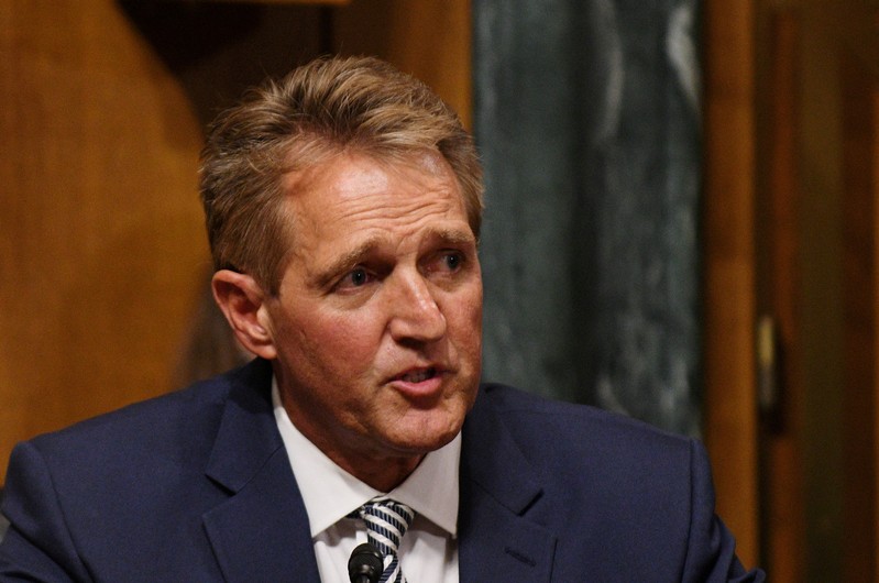 Sen. Jeff Flake, R-AZ, requests an FBI investigation during the Senate Judiciary Committee meeting