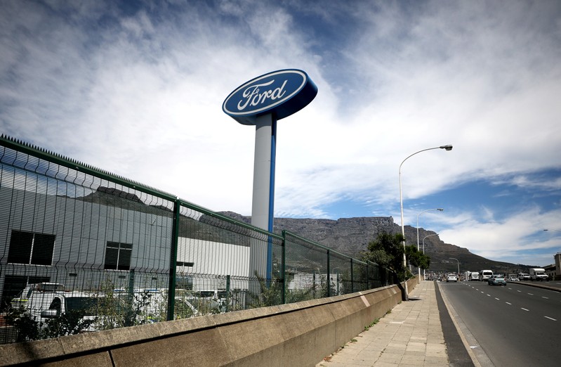 The logo of the Ford Motor Company is seen outside a car dealership in Cape Town