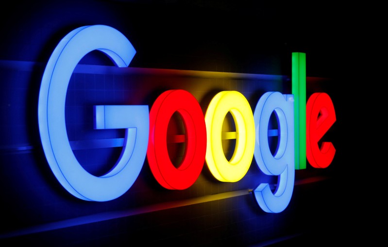 FILE PHOTO: An illuminated Google logo is seen in Zurich