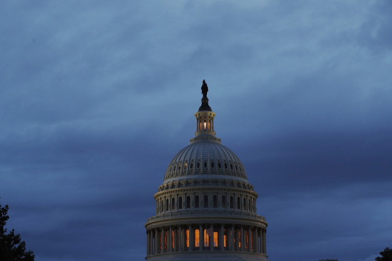 Storm clouds swirl over the U.S. Capitol building in Washington