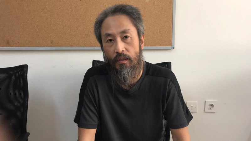 Japanese journalist Jumpei Yasuda is pictured at the local police headquarters in Hatay