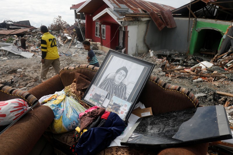Recoverd personal items are pictured outside a home in the earthquake and liquefaction affected Balaroa neighbourhood in Palu