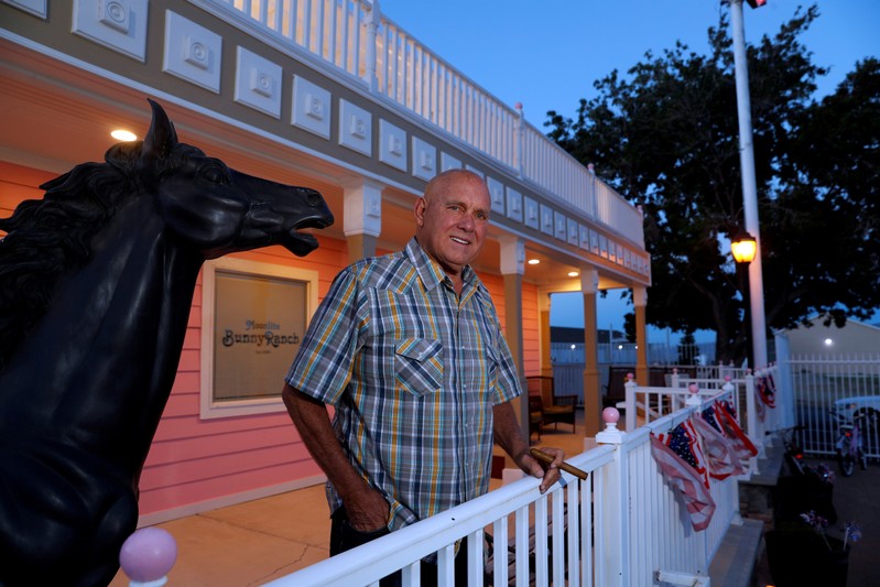 FILE PHOTO: Dennis Hof, owner of the Moonlite BunnyRanch legal brothel and recent winner of the Republican primary election for Nevada State Assembly District 36, poses outside the brothel in Mound House, Nevada