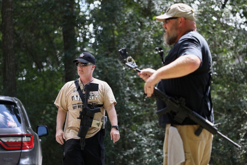 Members of Open Carry Texas openly carry firearms in Houston