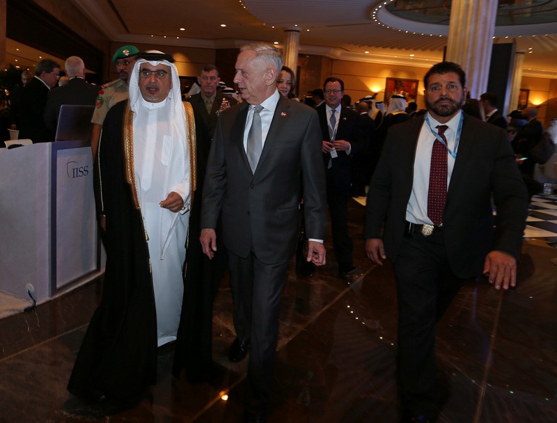 Bahrain's Crown Prince Salman bin Hamad al-Khalifa walks with the U.S. Defense Secretary James Mattis at the inauguration of the 14th regional security summit 