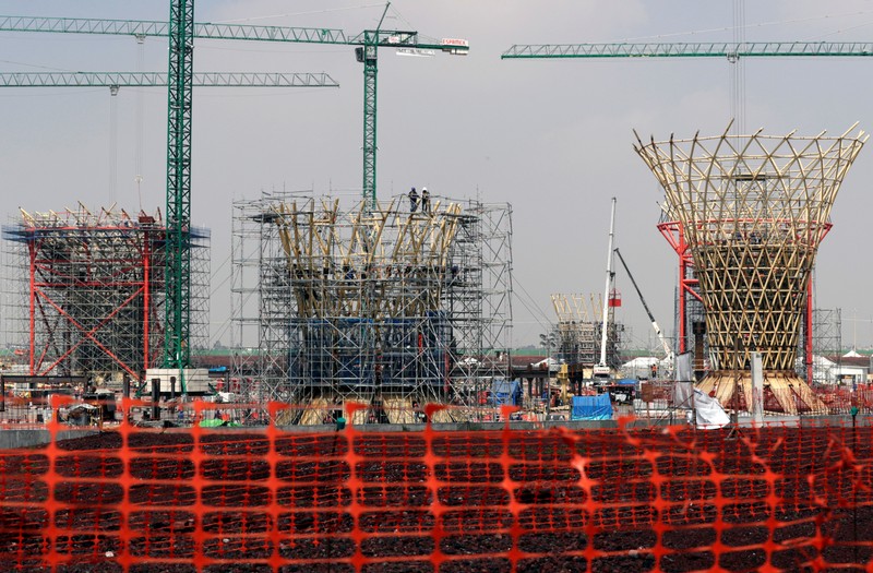FILE PHOTO: Employees work on the terminal area at the construction site of the new Mexico City International Airport in Texcoco