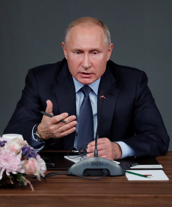 Russian President Vladimir Putin attends a news conference at the Syria summit in Istanbul